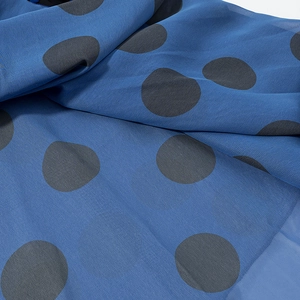 Blue retro polka dot chiffon dress featuring a layered mermaid hem and sleek silhouette