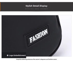 Close-up of black matte chest bag showing the raised FASHION logo detail