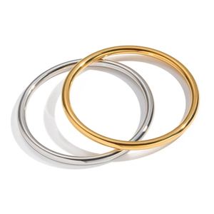 Minimalist stainless steel circular bangles in vacuum-plated 18K gold and silver finish