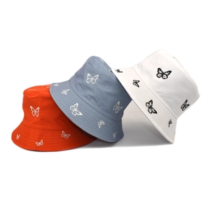 Bob réversible en coton avec broderie papillon en orange, bleu et blanc pour soleil
