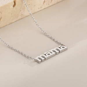 Detailed close-up of 3D mama pendant on a fine silver stainless steel chain