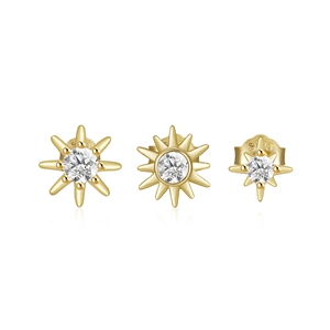 Macro shot of S925 sterling silver gold plated star stud earrings with clear zircons