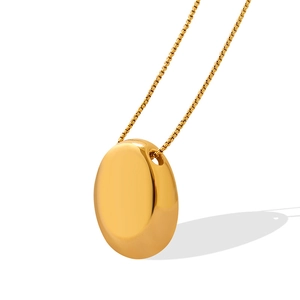 Minimalist gold oval pebble pendant necklace with high-polish finish on a fine chain