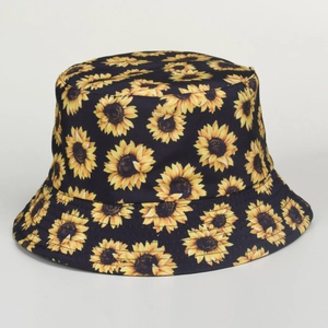 Minimalist black cotton bucket hat with vibrant sunflower floral print for sun protection