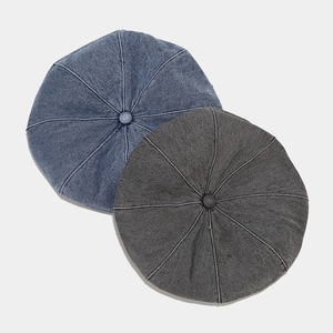 Classic denim beret hats in light blue and dark grey with vintage 8-panel stitch design