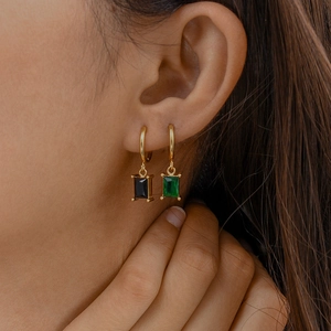 French style gold earrings featuring emerald green and black rectangular zircon stones