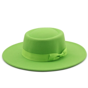 Neon green wool felt wide brim fedora hat with matching ribbon bow and flat top crown