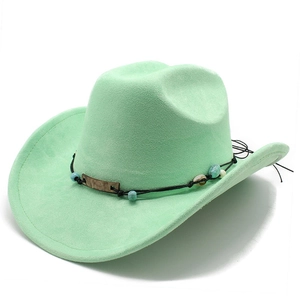 Detail of mint green suede western cowboy hat with beaded band and metallic accent
