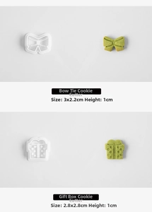 Detail of mini Christmas cookie molds with bow and gift box shapes for baking