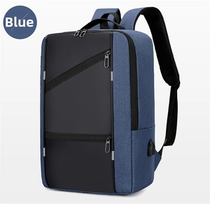 Blue business laptop backpack featuring side USB charging port and multiple zipper pockets