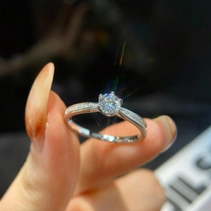 Classic 925 sterling silver six-prong moissanite engagement ring with side diamonds