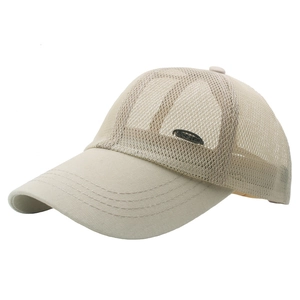Detail of beige mesh baseball cap with side metal fashion plate and breathable net