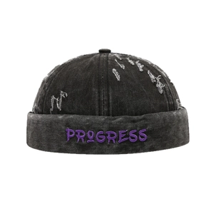 Bonnet docker noir délavé avec broderie PROGRESS violette et détails usés de style
