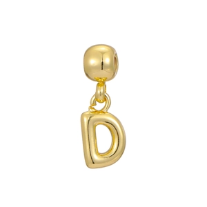 Macro detail of 18k gold plated bubble initial D pendant with shiny metallic finish