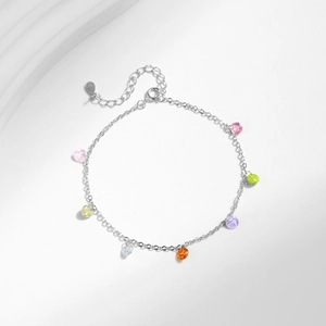 Minimalist S925 sterling silver bracelet with multi-colored round crystals on white background