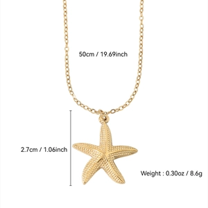 Detailed view of 18k gold starfish pendant with textured finish and 50cm chain dimensions