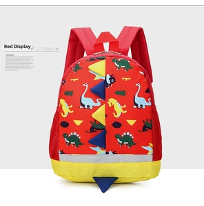 Front view of red dinosaur backpack for kids featuring 3D fins and reflective safety strip
