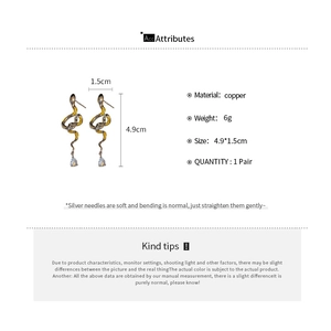 Detail view showing dimensions and weight of snake drop earrings with yellow zircon