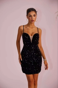Detail of black sequined V-neck dress featuring sheer mesh panels and a bodycon silhouette