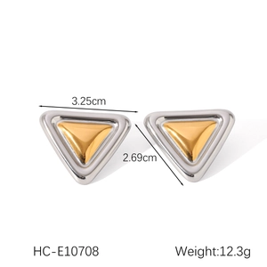 Detailed view of bicolor triangle earrings with size labels and geometric design