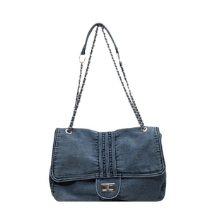 Retro blue denim tote bag with chain strap and silver twist lock for daily commute