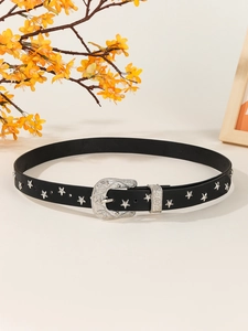 Close-up of black western belt with engraved silver buckle and star metal rivets