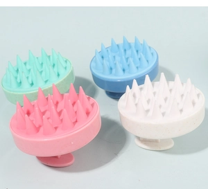 Macro view of silicone scalp massager brushes in multiple colors with soft bristles