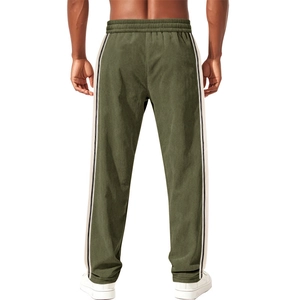 Detail of olive green corduroy pants featuring side stripes and relaxed fit back view