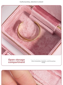 Macro view of the pink velvet jewelry box showing a spacious inner layer for bracelets
