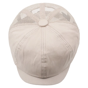 Detail of beige mesh newsboy cap showing breathable hollow-out fabric and short curved brim