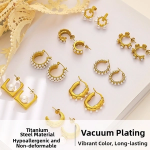 Close-up of assorted 18k gold plated titanium steel earrings with pearls and crystals