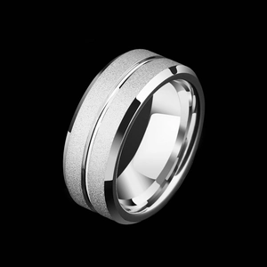 Mens silver steel ring with frosted finish and polished edges shown from a side angle