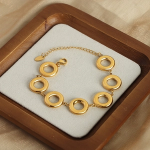 Minimalist gold plated stainless steel geometric chain bracelet on elegant display