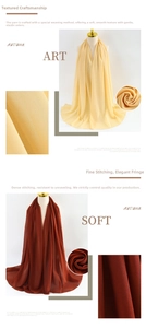Detail of beige and brown pearl chiffon scarf showing soft elastic texture and fine stitching