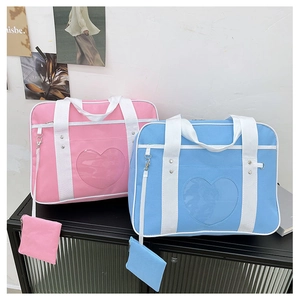 Pink and blue JK uniform ita bags with heart shaped clear window and matching coin purses
