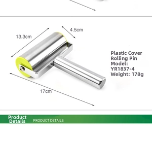 Detail view of a 17cm stainless steel rolling pin with yellow caps and 178g weight