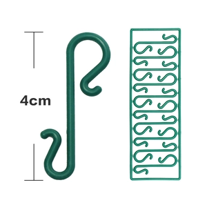 Detail view of 4cm green plastic S-shaped Christmas hooks for tree ornament hanging