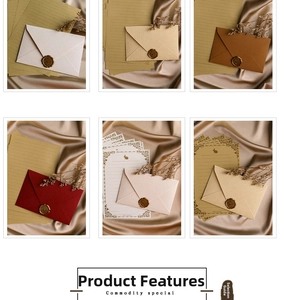 Detailed view of vintage stationery set with wax seals and linen textured envelopes