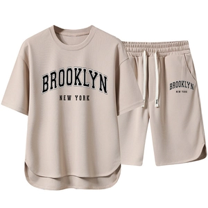 Detail of Brooklyn print on apricot men's summer t-shirt and drawstring shorts set