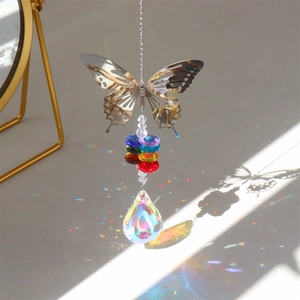 Silver metal butterfly suncatcher with colorful crystal beads and rainbow prism pendant