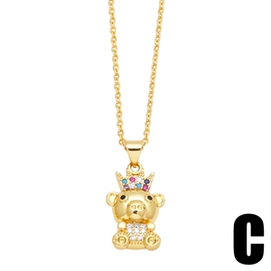 Cute gold necklace featuring a bear pendant with crown and colorful cubic zirconia