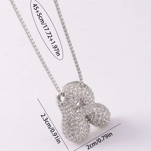 Detail view of silver zircon letter necklace with precise size measurements in cm