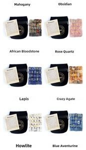 Detailed set of 25 engraved rune stones in various natural crystals with black velvet pouch