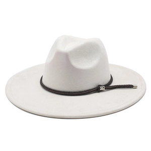 Detailed view of white wide brim fedora with brown braided rope and silver buckle