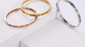 Three-color Greek meander hollow bracelets in rose gold, gold, and silver finishes