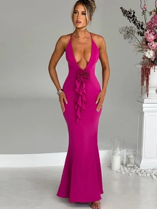 Detail of rose red halter maxi dress featuring ruffle trim and 3D floral accents