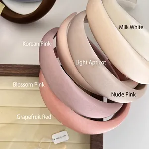 Padded sponge headbands in soft pastel colors like cream white and nude pink
