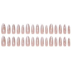 Cat eye press-on nails with silver star patterns and rhinestones in almond shape
