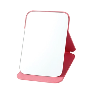 Detail of pink PU leather foldable vanity mirror showing textured surface and stand