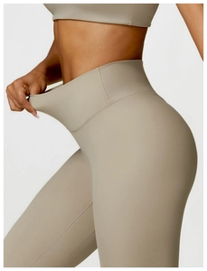Detail of high-waist yoga pants with stretchy waistband for tummy control and support